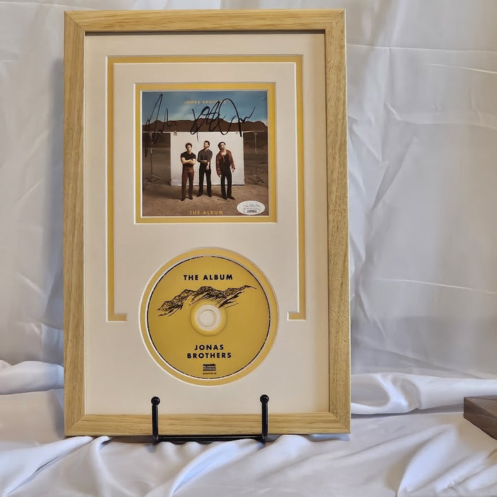 Jonas Brothers Signed The Album CDAutographed JSA Authenticated