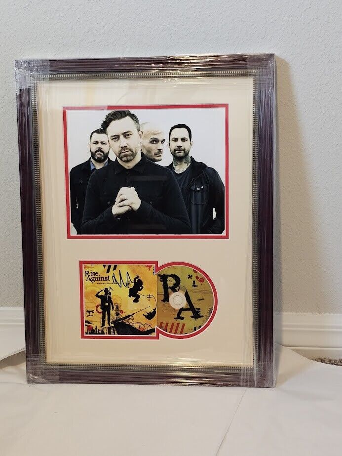 Rise Against Signed CD  Apeal to Reason Autographed JSA COA Tim Mcilrath