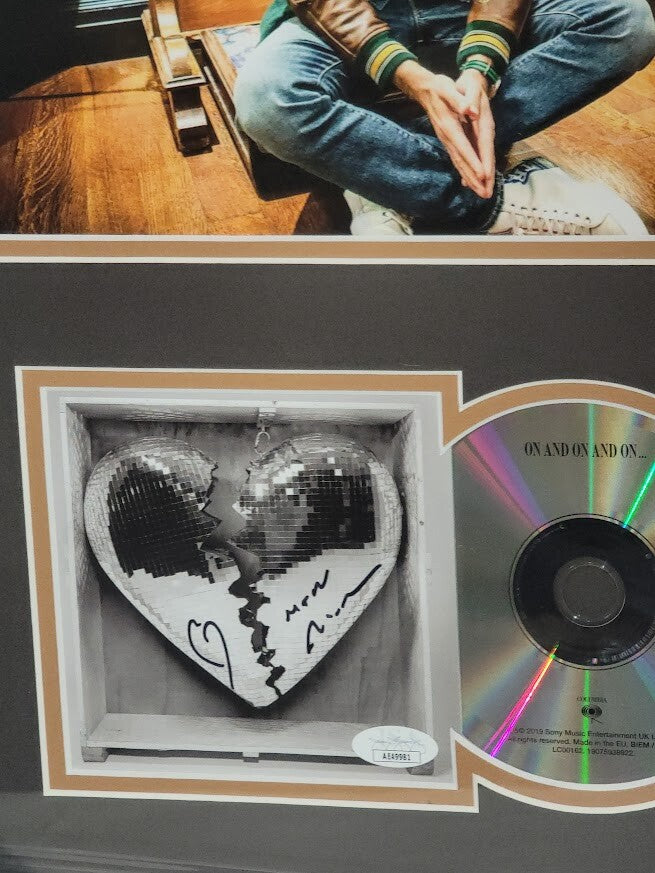 Mark Ronson autographed signed On and On and On CD JSA Certified Framed
