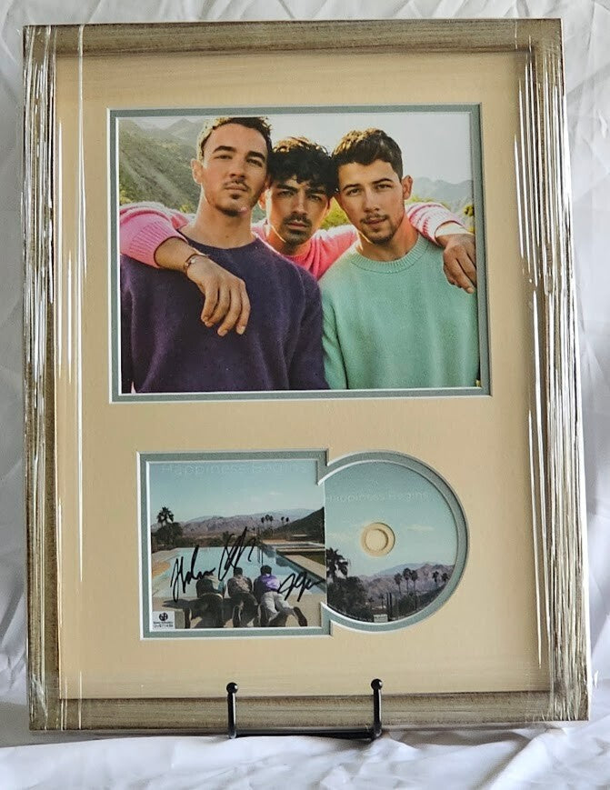 Jonas Brothers Band  autographed Signed Happiness Begins  Global Authentics COA